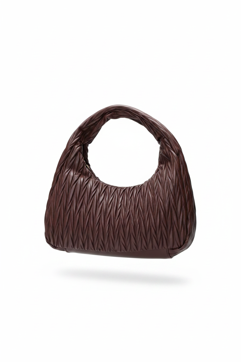 Brown textured handbag on a white background