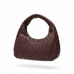 Brown textured handbag on a white background