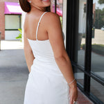 Blake Dress by ASTR white strapless mini dress with a draped wrap skirt