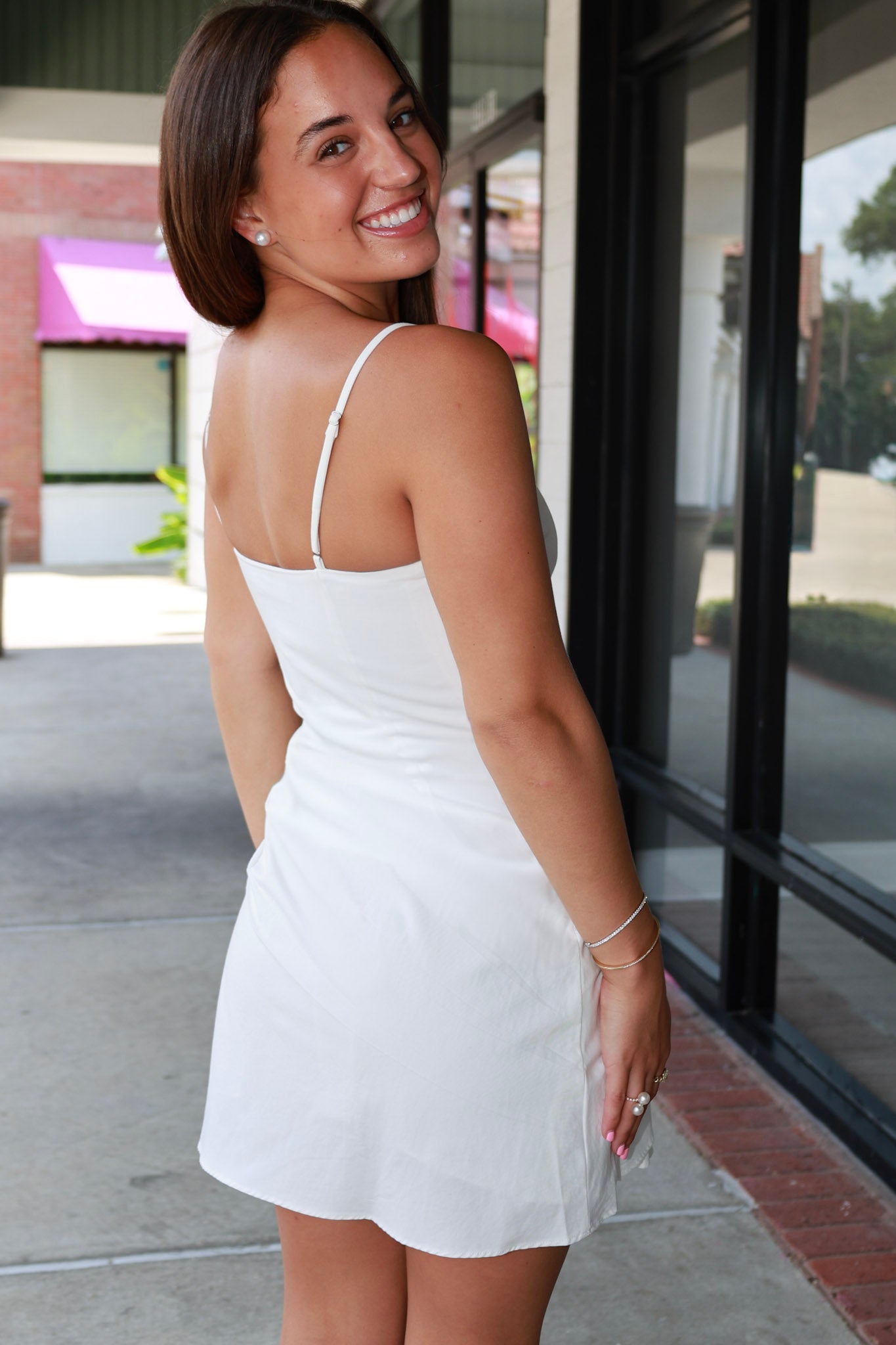 Blake Dress by ASTR white strapless mini dress with a draped wrap skirt