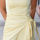 Cheryl Romper by Amanda UpRichard a yellow strapless romper 