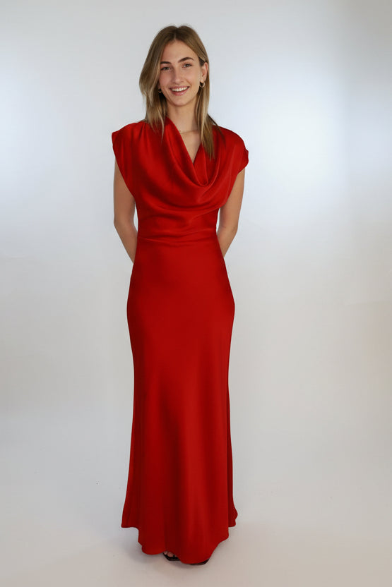 Woman wearing a satin red dress maxi dress