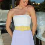 Fae Romper, Amanda Uprichard —a purple yellow strapless color-block mini