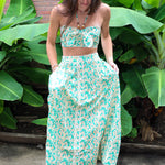 Woman wearing a Keisha Skirt Kehlani Top green floral matching separates.
