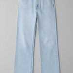 Light blue jeans on a gray background