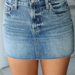 Pistola Blue denim skirt worn by a person on a neutral background