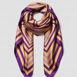 A square silk scarf featuring a geometric pattern of concentric squares in purple and yellow, displayed flat with soft folds on a white background.