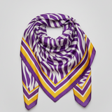 A square scarf with a purple and white zebra-like pattern and yellow geometric border stripes, displayed on a neutral light gray background.