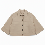 Beige jacket with button details on a white background