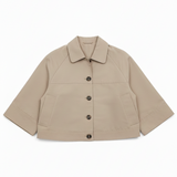 Beige jacket with button details on a white background