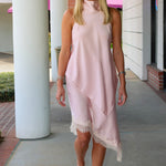 Sleeveless light pink mock-halter neck matching skirt set with a diagonal front cut and lace trim at Rodeo Boutique