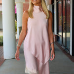 Sleeveless light pink mock-halter neck matching skirt set with a diagonal front cut and lace trim at Rodeo Boutique